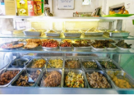 A rack of buffet-style food.